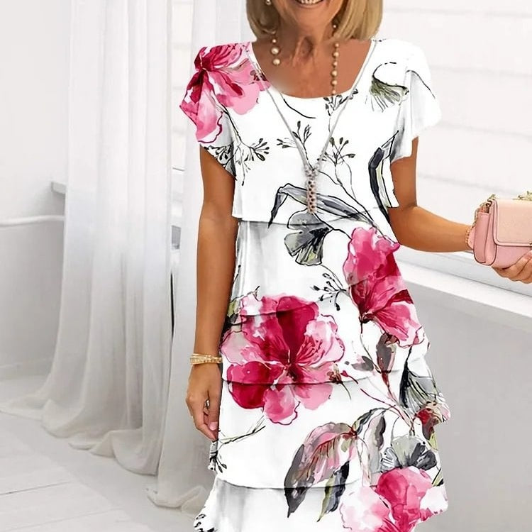 Flora™ Kleid – Elegantes Blumenmuster mit fließender Silhouette